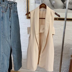 Blazer with built in top. Side cut outs.